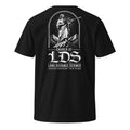 Back of a black NTHNG Church of LDS T-shirt with a white robed figure holding a rifle above mountains and "Long Distance Science" lettering.