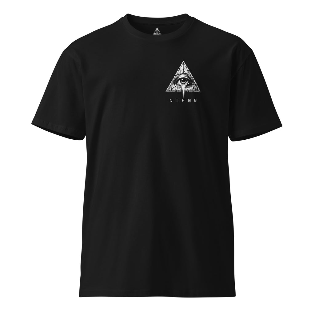 Front of a black NTHNG/MAD Smile T-shirt with a small white eye-in-triangle logo and NTHNG lettering on the left chest.